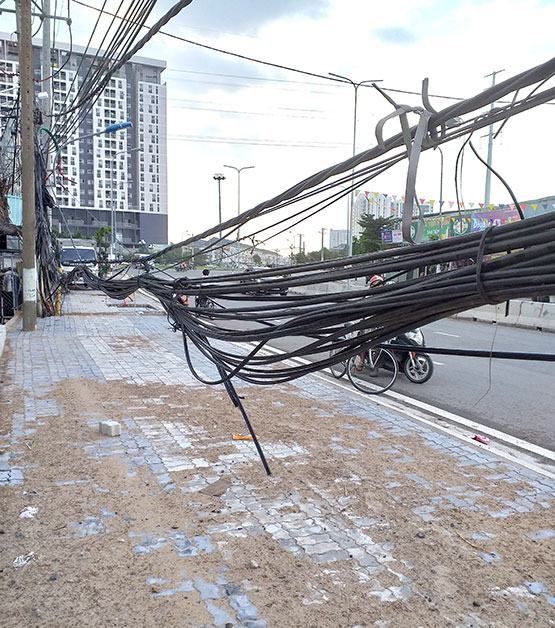 Nguy hiểm bó dây cáp võng xuống quá thấp