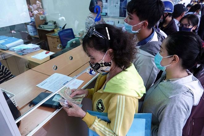 Tăng học phí sẽ tác động rất lớn đến đời sống của người dân hiện nay Ảnh: ĐÀO NGỌC THẠCH 