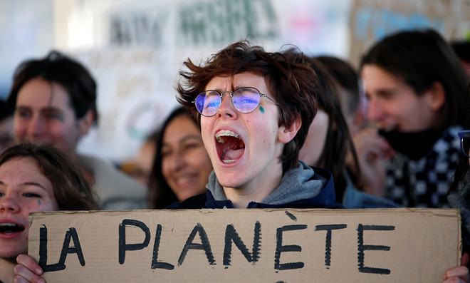 Hàng chục ngàn người tuần hành kêu gọi chống biến đổi khí hậu - ảnh 1