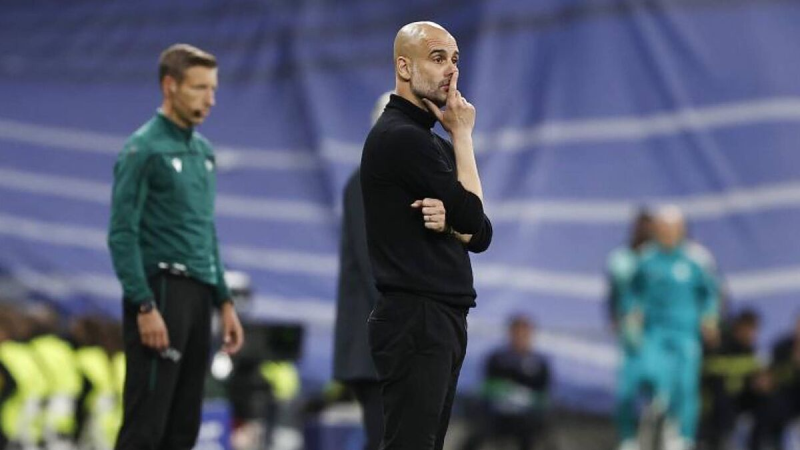 HLV Pep Guardiola thất thần khi Man City thua đau Real Madrid phút cuối