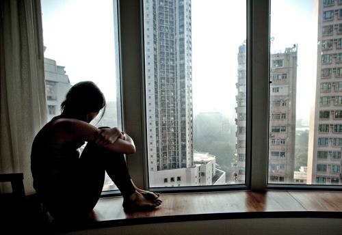A-lonely-girl-looking-out-012-1582-14125