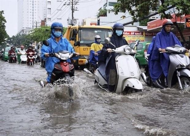 Nhieu khu vuc o Thanh pho Ho Chi Minh ngap nang do mua lon hinh anh 1