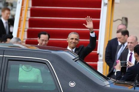 Những hình ảnh đầu tiên của Tổng thống Mỹ Barack Obama tại TP.HCM - ảnh 1
