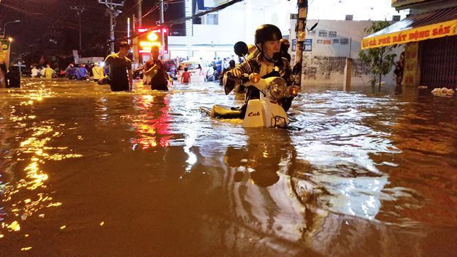 Ngập nước có một phần nguyên nhân do triều cường, lún đất và cốt nền thấp hơn mực nước biển /// Ảnh: An Huy